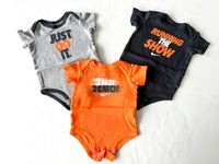 Nike 3-pack grey/orange bodysuits  (3-6 months)